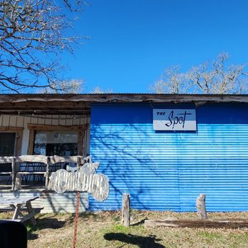 The Spot At Lake Somerville - a blue house with a sign on it - Burgers Near Me - Somerville, Texas The Spot At Lake Somerville - a blue house with a sign on it - Burgers Near Me - Somerville, Texas