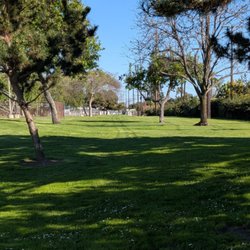 Candleverde Park - Open area of the park. Looks like a vehicle drove through it