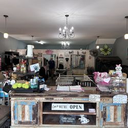 Shaggy Chic Pet Salon - Cute little shaggy chic shop interior with items to buy for your pets. The little dogs are placed on baby cribs. Very nice.