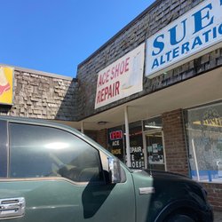 Ace shoe repair sign