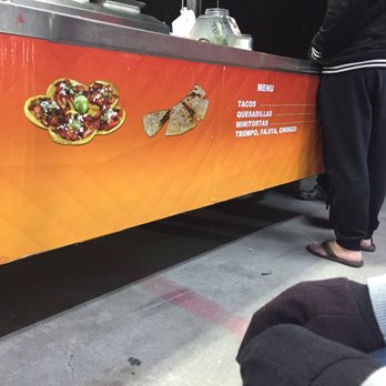 Taqueria Perez - a man standing in front of a taco stand - Tacos Near Me - Cypress, Texas Taqueria Perez - a man standing in front of a taco stand - Tacos Near Me - Cypress, Texas