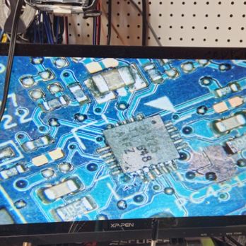 Computer Repair World - Microscope image of damaged logic board - IT Services & Computer Repair Near Me - Middletown, New York