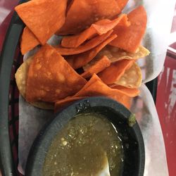 Green salsa and fresh made tortilla chips