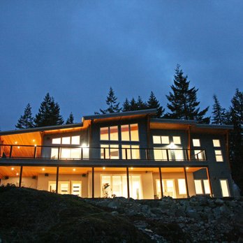 Green City Builders - a modern home at night - General Contractors Near Me - Salt Spring Island, British Columbia Green City Builders - a modern home at night - General Contractors Near Me - Salt Spring Island, British Columbia