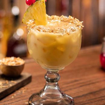Cheddar's Scratch Kitchen - Cheddar’s Painkiller: Pusser’s rum, cream of coconut, pineapple juice, orange juice, toasted coconut rim, topped w/nutmeg. Limit 2 per guest - American Near Me - Fort Wayne, Indiana
