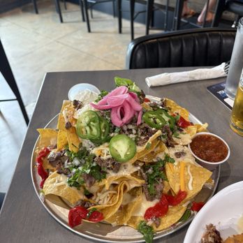 The Brass Tap - Sirloin Steak Nachos - Wine Bars Near Me - Olivette, Missouri The Brass Tap - Sirloin Steak Nachos - Wine Bars Near Me - Olivette, Missouri
