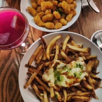 The Coopers Tavern - Coopers cheese curds (top) and poutine (bottom) - New American Near Me - Madison, Wisconsin The Coopers Tavern - Coopers cheese curds (top) and poutine (bottom) - New American Near Me - Madison, Wisconsin