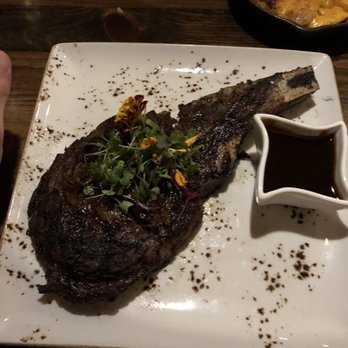 Jimmy P's Charred - Cowboy ribeye. - Steakhouses Near Me - Naples, Florida Jimmy P's Charred - Cowboy ribeye. - Steakhouses Near Me - Naples, Florida