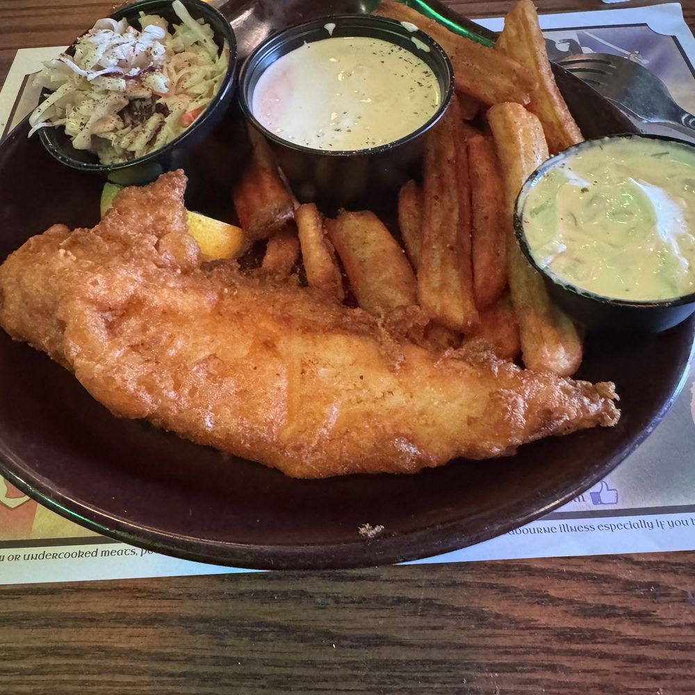 Meg O'Malley's - Lunch portion fish and chips - Pubs Near Me - Melbourne, Florida Meg O'Malley's - Lunch portion fish and chips - Pubs Near Me - Melbourne, Florida