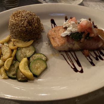 French Quarter Grille - French Quarter Salmon (prosciutto, crab, basil pesto, tomato), Veggie de Jour (yellow squash, zucchini), dirty rice - American Near Me - Austin, Texas French Quarter Grille - French Quarter Salmon (prosciutto, crab, basil pesto, tomato), Veggie de Jour (yellow squash, zucchini), dirty rice - American Near Me - Austin, Texas