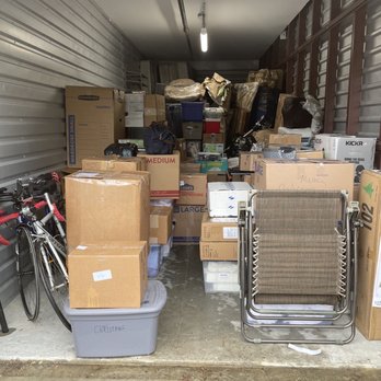 Blue Collar Moving - Storage unit packed by Blue Collar. You can see the furniture wrapped up nicely and placed in the back. - Movers Near Me