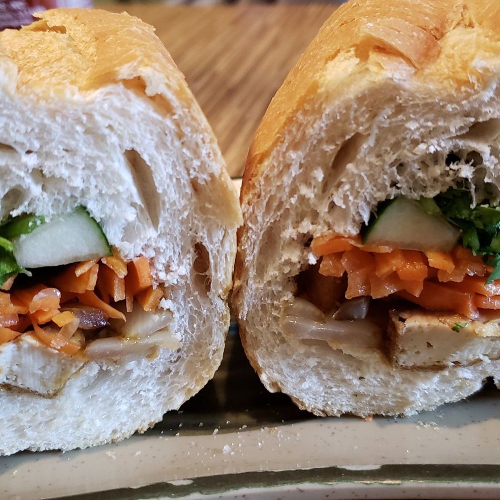 Jasmine Deli - Tofu banh mi, vegan w/o butter ($4). Warm, flaky, perfect bread. Nicely spiced tofu. Best banh mi in the US, no joke. - Vietnamese Near Me - Minneapolis, Minnesota Jasmine Deli - Tofu banh mi, vegan w/o butter ($4). Warm, flaky, perfect bread. Nicely spiced tofu. Best banh mi in the US, no joke. - Vietnamese Near Me - Minneapolis, Minnesota
