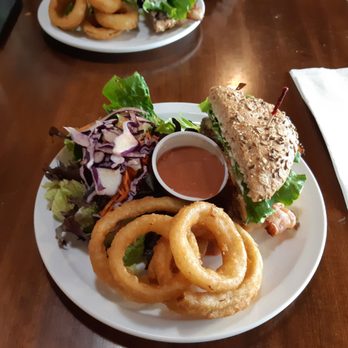 Burger Heaven - Backyard burger and two sides (salad and upgraded onion rings) split in two - Burgers Near Me - New Westminster, British Columbia Burger Heaven - Backyard burger and two sides (salad and upgraded onion rings) split in two - Burgers Near Me - New Westminster, British Columbia