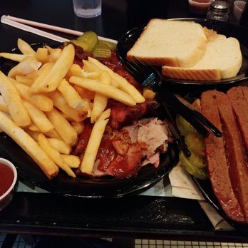 Gates Bar-B-Q - Mixed plate with smoked sliced pork, brisket, and ribs along with a sausage plate. - Barbeque Near Me - Leawood, Kansas Gates Bar-B-Q - Mixed plate with smoked sliced pork, brisket, and ribs along with a sausage plate. - Barbeque Near Me - Leawood, Kansas