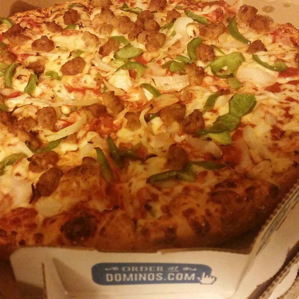 Medium hand tossed sausage, onion and green pepper pizza. Medium hand tossed sausage, onion and green pepper pizza.