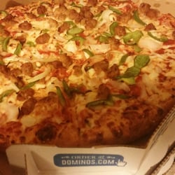 Domino's Pizza - Medium hand tossed sausage, onion and green pepper pizza.