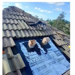 Isaacs Roofing - View of the high quality materials used. Clearly indicates wind and water resistant made in the USA.