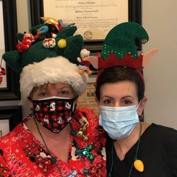 Dental Art Concepts - Santa's helpers make sure our patient's leave smiling.