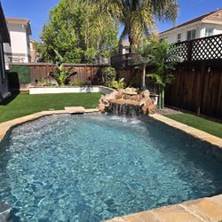 Aquos Pools - This is the after pic from the opposite side. The waterfall is our favorite feature.