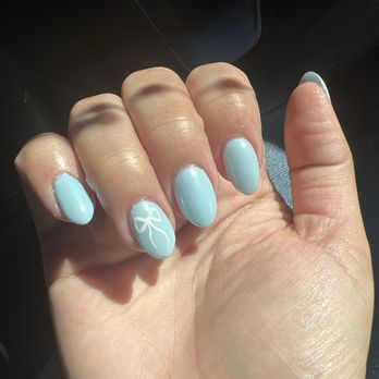 Lush Spa Nails - After: Acrylic, light blue gel polish, chrome and bow art - Nail Salons Near Me - Chino Hills, California Lush Spa Nails - After: Acrylic, light blue gel polish, chrome and bow art - Nail Salons Near Me - Chino Hills, California