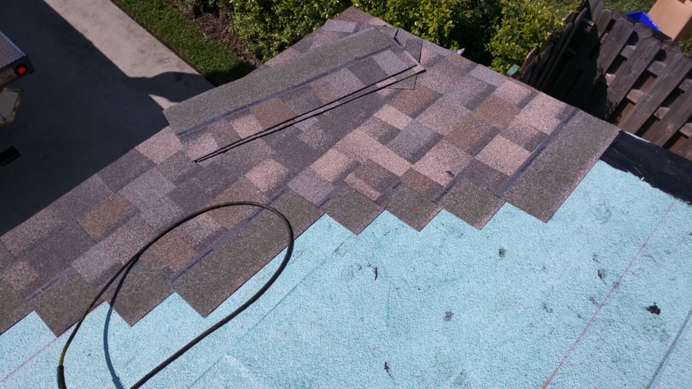 Slide of Riggs Roofing