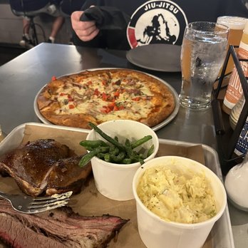 Pinehurst Brewing Company - Bbq pizza and 2 meat two side brisket and chicken with greens beans and potato salad. - Brewpubs Near Me - Pinehurst, North Carolina