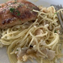 Half eaten order of Parmesan crusted chicken entree Half eaten order of Parmesan crusted chicken entree