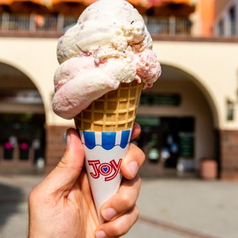 Andrades Paleteria Y Neveria - a hand holding an ice cream cone - Desserts Near Me - Lynwood, California Andrades Paleteria Y Neveria - a hand holding an ice cream cone - Desserts Near Me - Lynwood, California