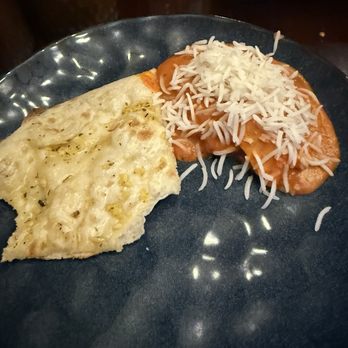 Sula- Main Street - Garlic naan and butter chicken with rice - Indian Near Me - Vancouver, British Columbia Sula- Main Street - Garlic naan and butter chicken with rice - Indian Near Me - Vancouver, British Columbia