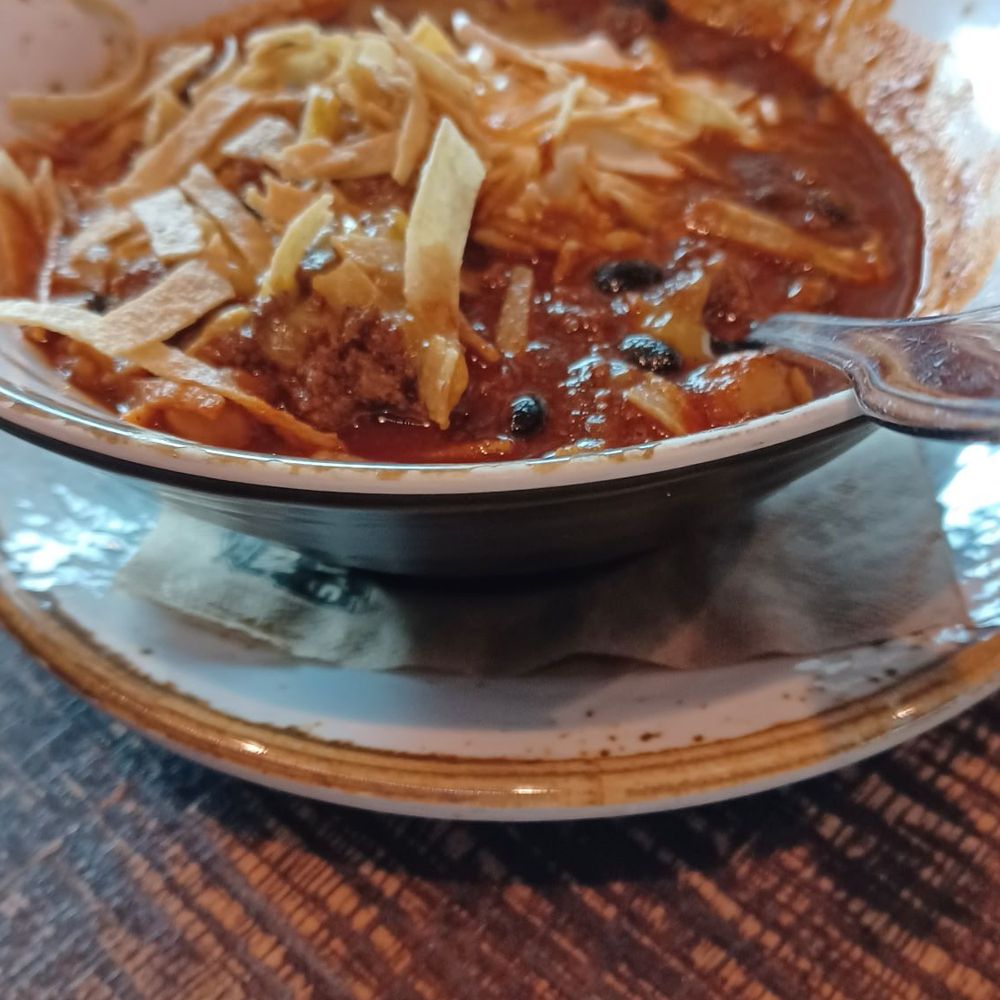 Henry's Tavern - chili w/t cheese, sour cream & tortilla strips (bowl) - Breakfast & Brunch Near Me - Portland, Oregon Henry's Tavern - chili w/t cheese, sour cream & tortilla strips (bowl) - Breakfast & Brunch Near Me - Portland, Oregon