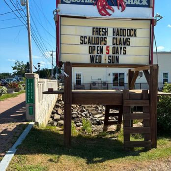 McLaughlin's Lobster Shack - Sign out front with another notable feature.. - Seafood Near Me - Lincolnville, Maine