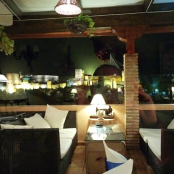 Restaurante San Nicolas - From inside the restaurant. Outdoor and indoor seating. - Spanish Near Me - Granada, GR Restaurante San Nicolas - From inside the restaurant. Outdoor and indoor seating. - Spanish Near Me - Granada, GR