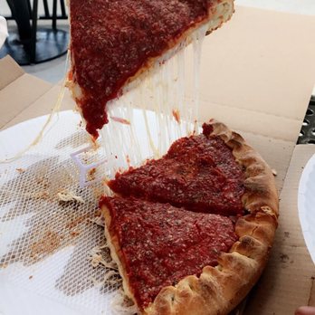 Rosati's Pizza - The cheese pull - Pizza Near Me - Largo, Florida Rosati's Pizza - The cheese pull - Pizza Near Me - Largo, Florida