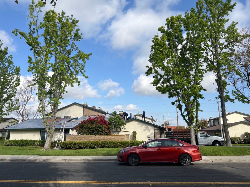 Slide of Tom Byer Roofing Service