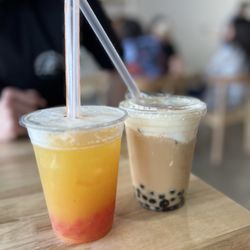 LaLa's Coffee And Boba - Passion fruit green tea with popping strawberry and tiramisu with brown sugar boba