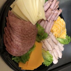 Empty Cup Coffee Bar and Bistro - Mae to order meat and cheese trays, fruit trays or veggies with dip