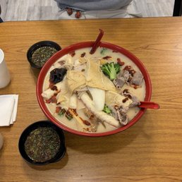 I added chili oil from the sauce bar as they don't have spice level options for their bone broth like most places