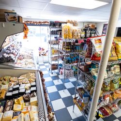 Eau Claire Cheese And Deli - Interior from back