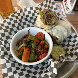 Snack wrap with side of seasoned veggies Snack wrap with side of seasoned veggies