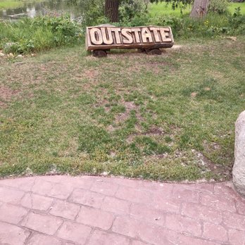 Outstate Brewing - wood carved OUTSTATE in front of the lake as you're about to round to the tap room - Breweries Near Me - Fergus Falls, Minnesota Outstate Brewing - wood carved OUTSTATE in front of the lake as you're about to round to the tap room - Breweries Near Me - Fergus Falls, Minnesota