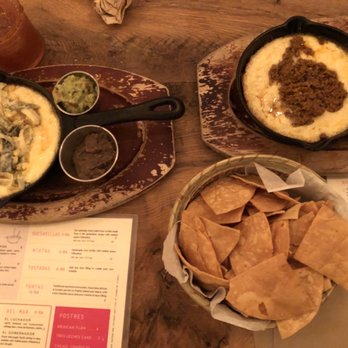 Clavel - Queso Fundido with vegetable and chorizo toppings - Bars Near Me - Baltimore, Maryland Clavel - Queso Fundido with vegetable and chorizo toppings - Bars Near Me - Baltimore, Maryland