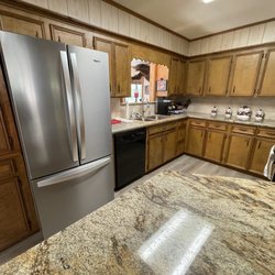 hawthorne fish & Fun - Open kitchen with window above sink into game room