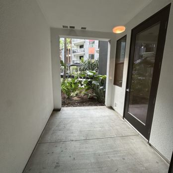 The George - Patio, those floor stains were there before I moved in! - Apartments Near Me - Anaheim, California