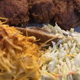 Mac and cheese with a sprinkle of spice, slaw and 3 dark meat chickens! Mac and cheese with a sprinkle of spice, slaw and 3 dark meat chickens!