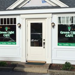 Hassan Wood Carving & Sign - Green Light Window Lettering