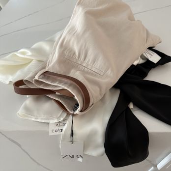 Zara - Carried merchandise out of the store like this and thru Disney Springs. - Women's Clothing Near Me - Orlando, Florida