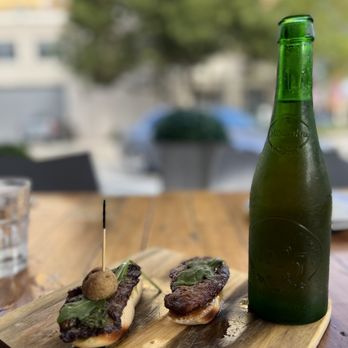 Patio Tapas and Beer - two sandwiches on a cutting board - Tapas/Small Plates Near Me - Boca Raton, Florida Patio Tapas and Beer - two sandwiches on a cutting board - Tapas/Small Plates Near Me - Boca Raton, Florida