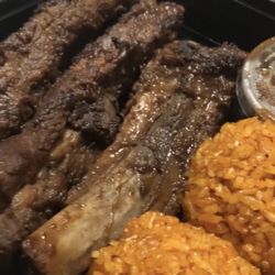 L8 Nyt Chow - Ribs and Red Rice.