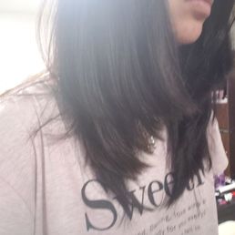This is the right side of my hair in layers that is ruined. She just cut it straight across where it's not even blended. This is the right side of my hair in layers that is ruined. She just cut it straight across where it's not even blended.