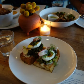 Launderette - Soft egg toast, in the background fried oysters and potato chips with pimento cheese - New American Near Me - Austin, Texas Launderette - Soft egg toast, in the background fried oysters and potato chips with pimento cheese - New American Near Me - Austin, Texas